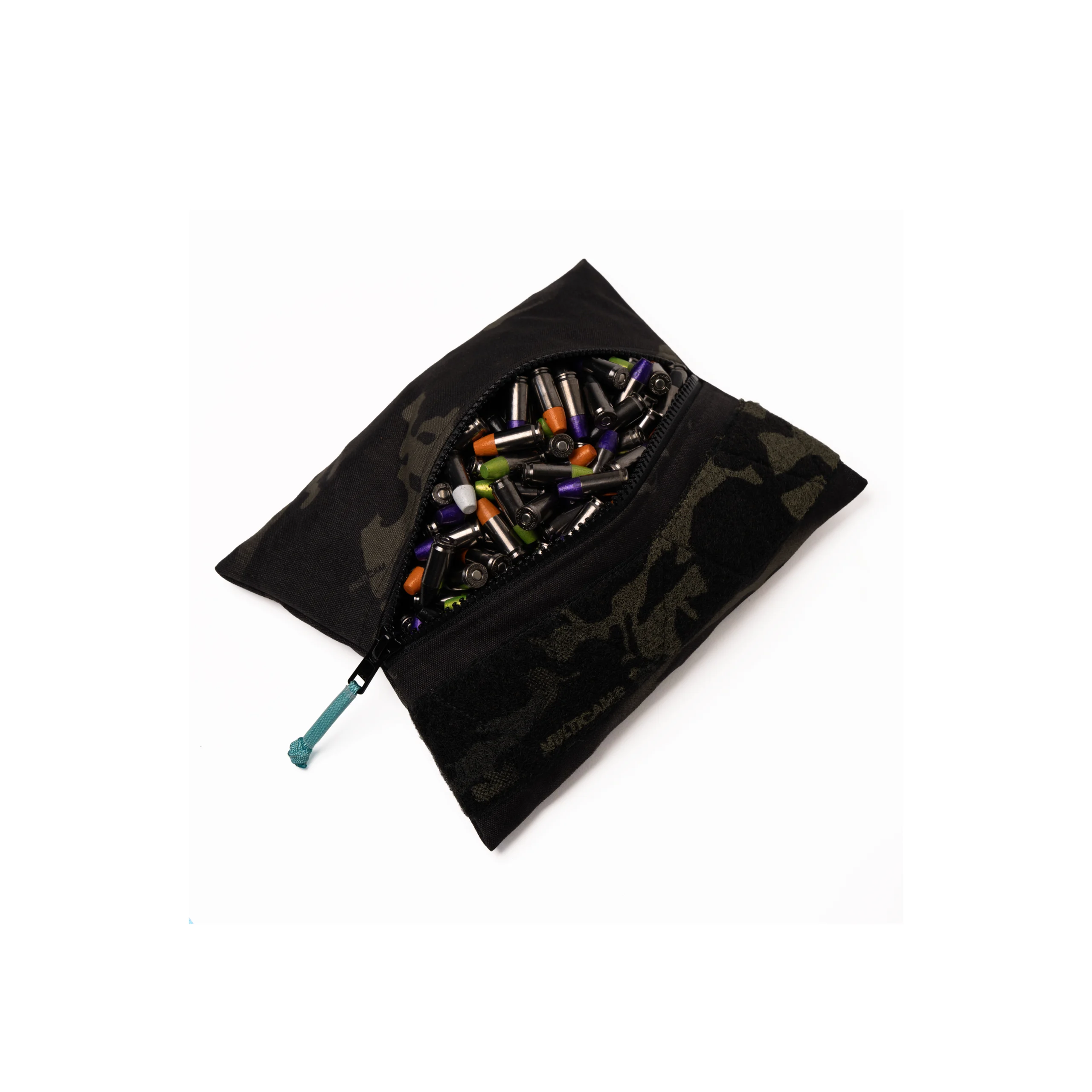 spooky shots 2 – Badlands Munitions Co Padded camouflage pouch opened to reveal a mix of colorful batteries spilling out.