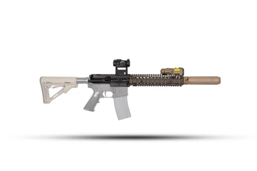 Side view of a tactical rifle with a red-dot sight, handguard rails, and a suppressor on the barrel against a white background.