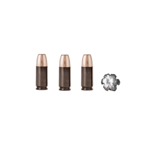 Three lipstick bullets in metal tubes aligned on a white background, with a crumpled foil piece to the right (product shot).