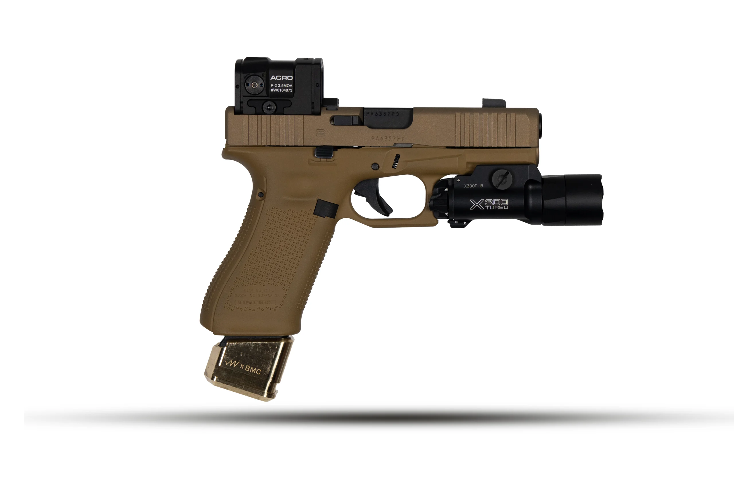 GLOCK G45X – Badlands Munitions Co Tan semi-automatic pistol with a black red-dot sight mounted on top and a black flashlight under the barrel area, magazine visible below the grip.