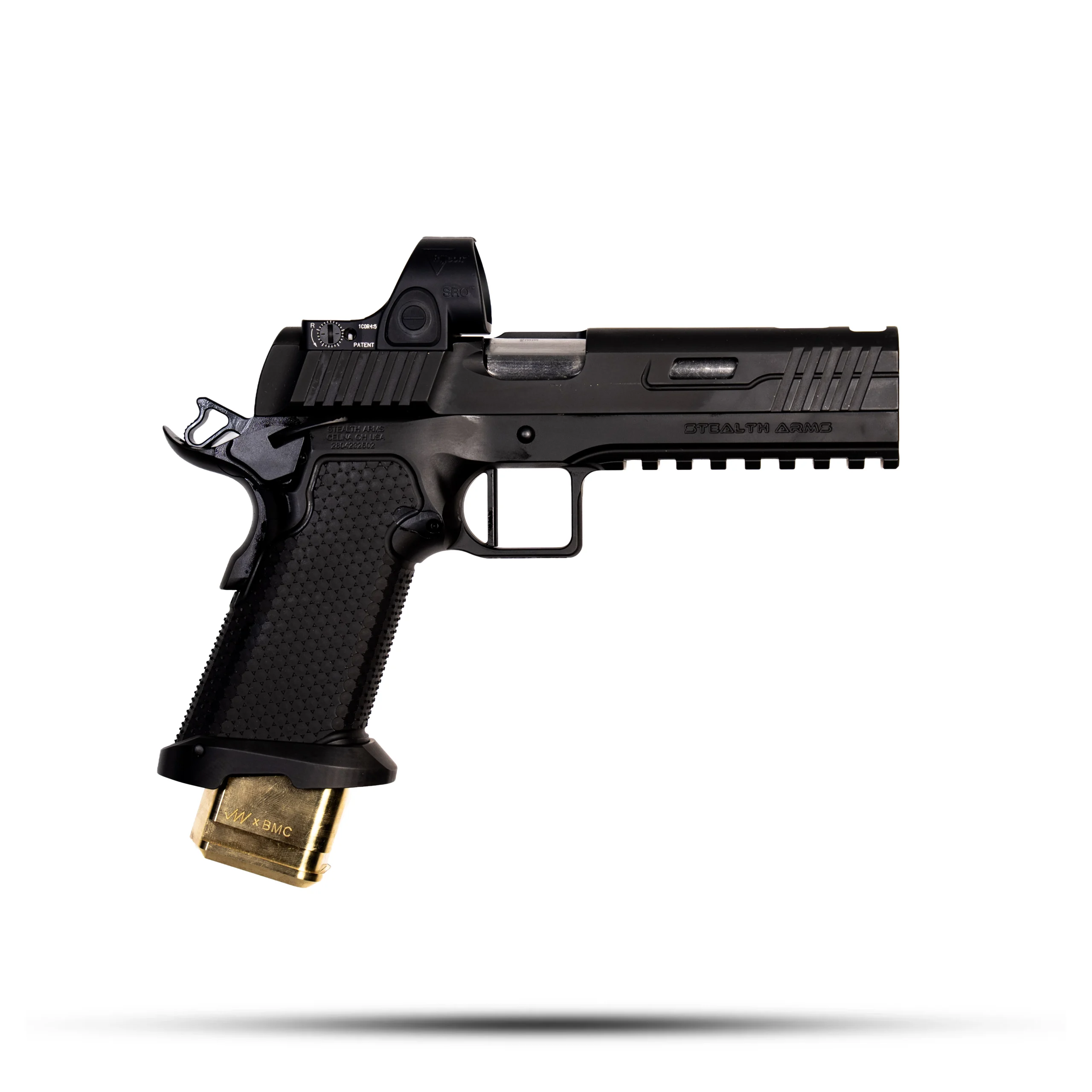 Close-up of a black semi-automatic handgun with a gold muzzle on a white background.