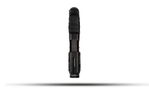 Vertical view of a black semi-automatic pistol with textured grip and metal slide, barrel pointing upward