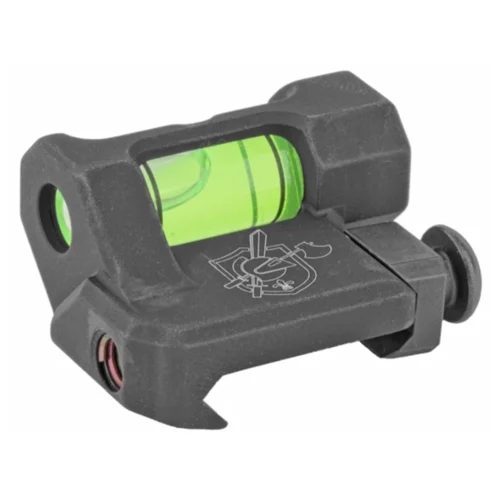 Compact black reflex sight with a green bubble level visible through the viewing window, mounted on a rail clamp for firearms.