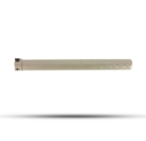m110 can – Badlands Munitions Co Beige marker pen floating above a soft shadow, viewed from the side with a textured grip end on the right side.