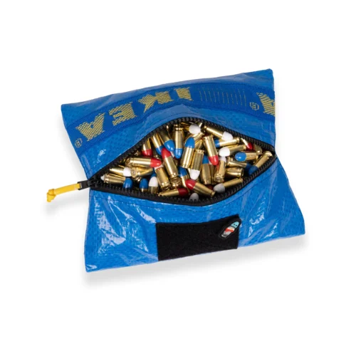 Blue zippered pouch opened to reveal a pile of brass ammunition inside and around the opening completely filling it with bullets and casings.