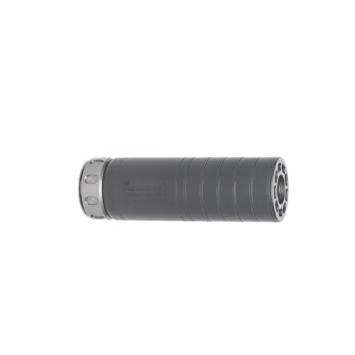 Gray cylindrical firearm suppressor lying horizontally with ridged body and end-cap details