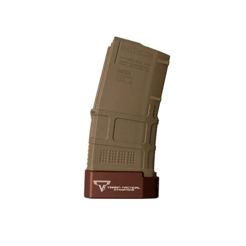 Tan rifle magazine with a brown base plate displaying the Taran Tactical Innovations logo.