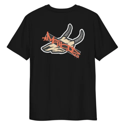 Black T-shirt with a stylized beige ram skull and curved horns, overlaid by a red graffiti-style banner across the skull.