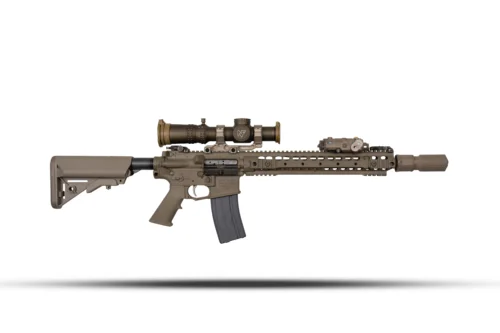 Tan tactical rifle with mounted scope, rail handguard, and adjustable stock viewed from the side.