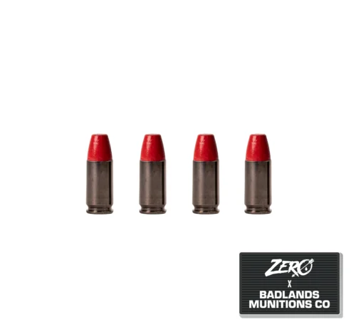 Row of five red lipstick bullets upright against a white background, with a black badge reading 'ZERO BADLANDS MUNITIONS CO' in the bottom-right corner.